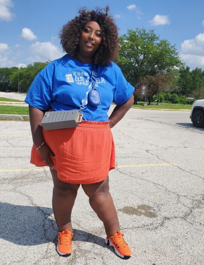 female wearing cheese grater purse