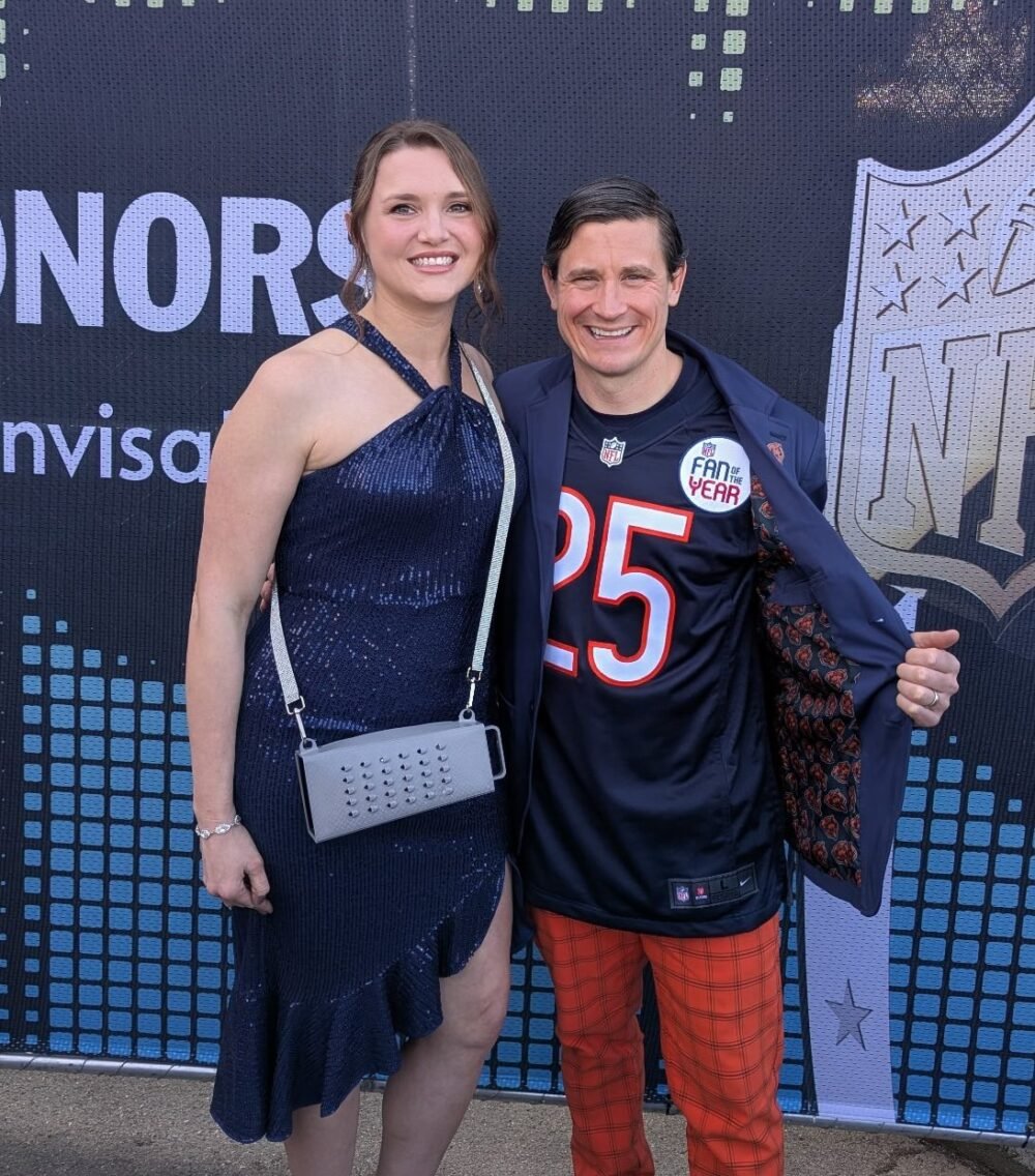 Jonathan Otten in a Bears jersey beside his wife, who carries the original silver Grater Purse, at the 2025 NFL Honors