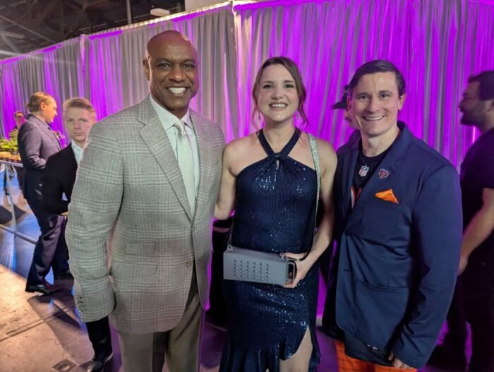 Guests posing with the Grater Purse at the NFL Honors after-party